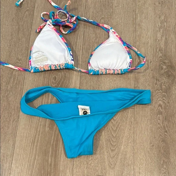 Vibrant Bikini with Patterned Top and Blue Bottoms - Picture 2 of 3